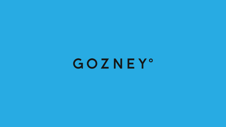 The GOZNEY pizza ovens logo on a sky blue background